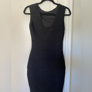 River Island pre loved stretchable fabric black dress, worn twice.